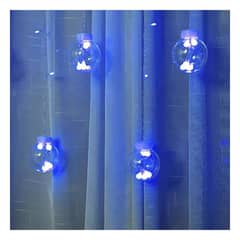 UNIVERSAL - CASCADA NAVIDAD PELOTAS TRANSPARENTES LUCES LED AZULES INTERIORES