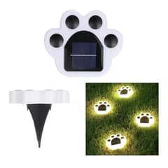 GENERICO - Pack x4 Luz Solar 4 Estacas Diseño Huella Cálidas Jardín Luces