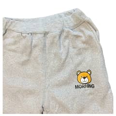 JUMP KIDS - Conjunto De Buzo Frizado Turquesa Con Chiporro Oso 4-8 años