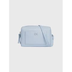 CALVIN KLEIN - Bandolera Daily Monogram Celeste