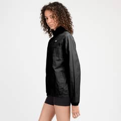 NEW BALANCE - Cortaviento Running Mujer Negro