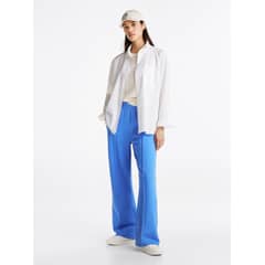 TOMMY HILFIGER - Joggers Varsity Graphic Con Logo Celeste