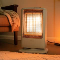 RECCO - Estufa Eléctrica 1.2kW NSB-99Y Compacta con Oscilación