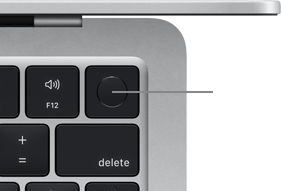 Se muestra la esquina superior derecha del teclado de un MacBook Air color plata para destacar el botón de Touch ID